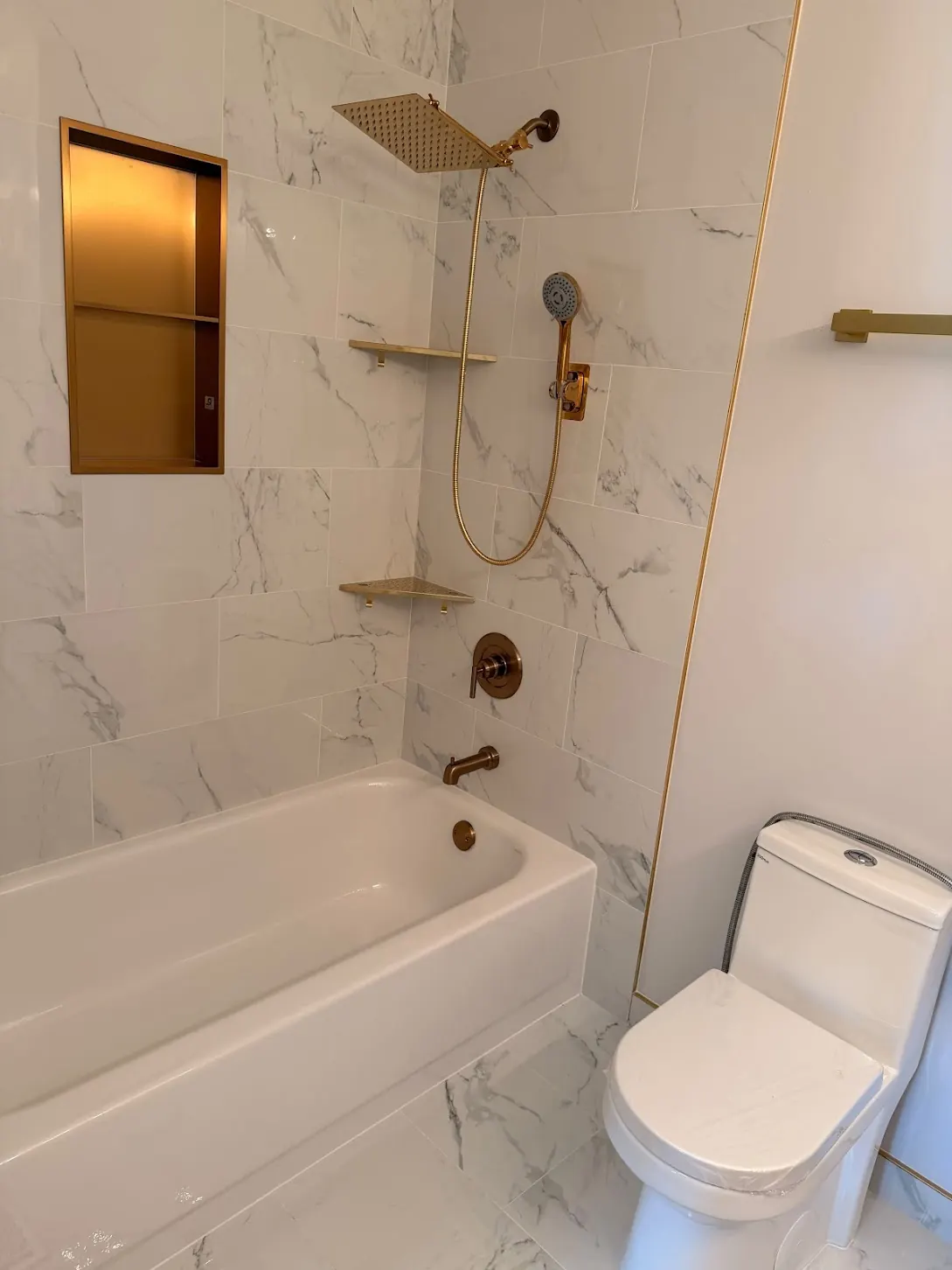 Finished bathroom with mounted fixtures and completed detail work